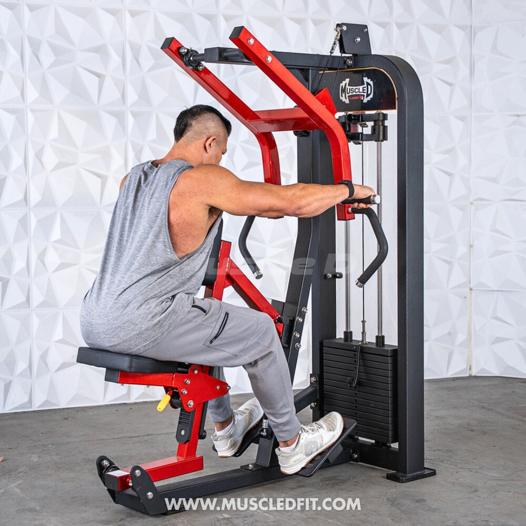Man using a red and black seated row machine with multi-grip handles and a weight stack.