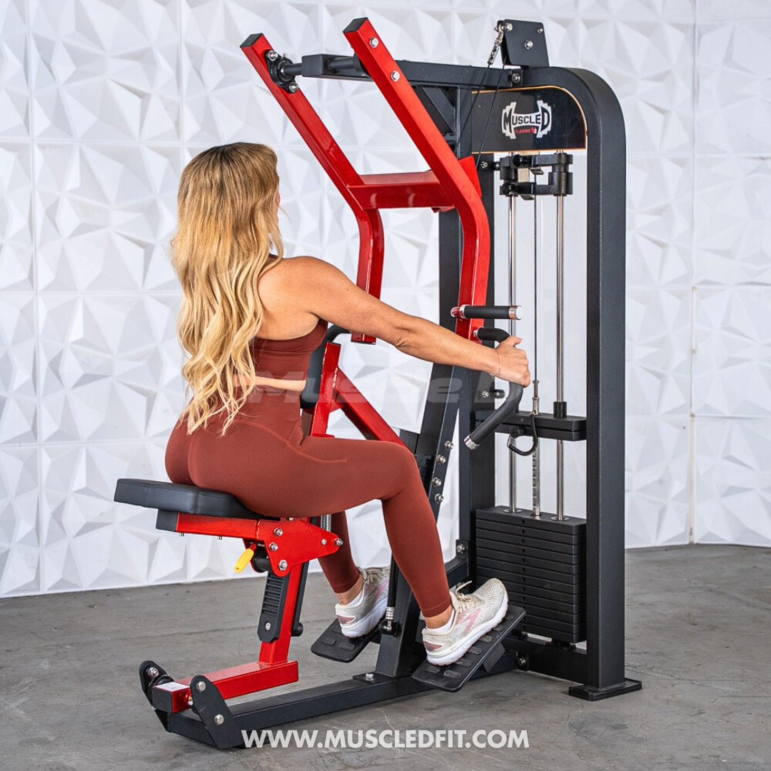 Woman using a red and black selectorized seated row machine with multi-grip handles and a weight stack.