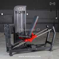 Thumbnail for Black and red selectorized leg press machine with a weight stack in a gym setting.