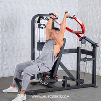 Thumbnail for Man using a black and red selectorized multi-press machine for a shoulder press.
