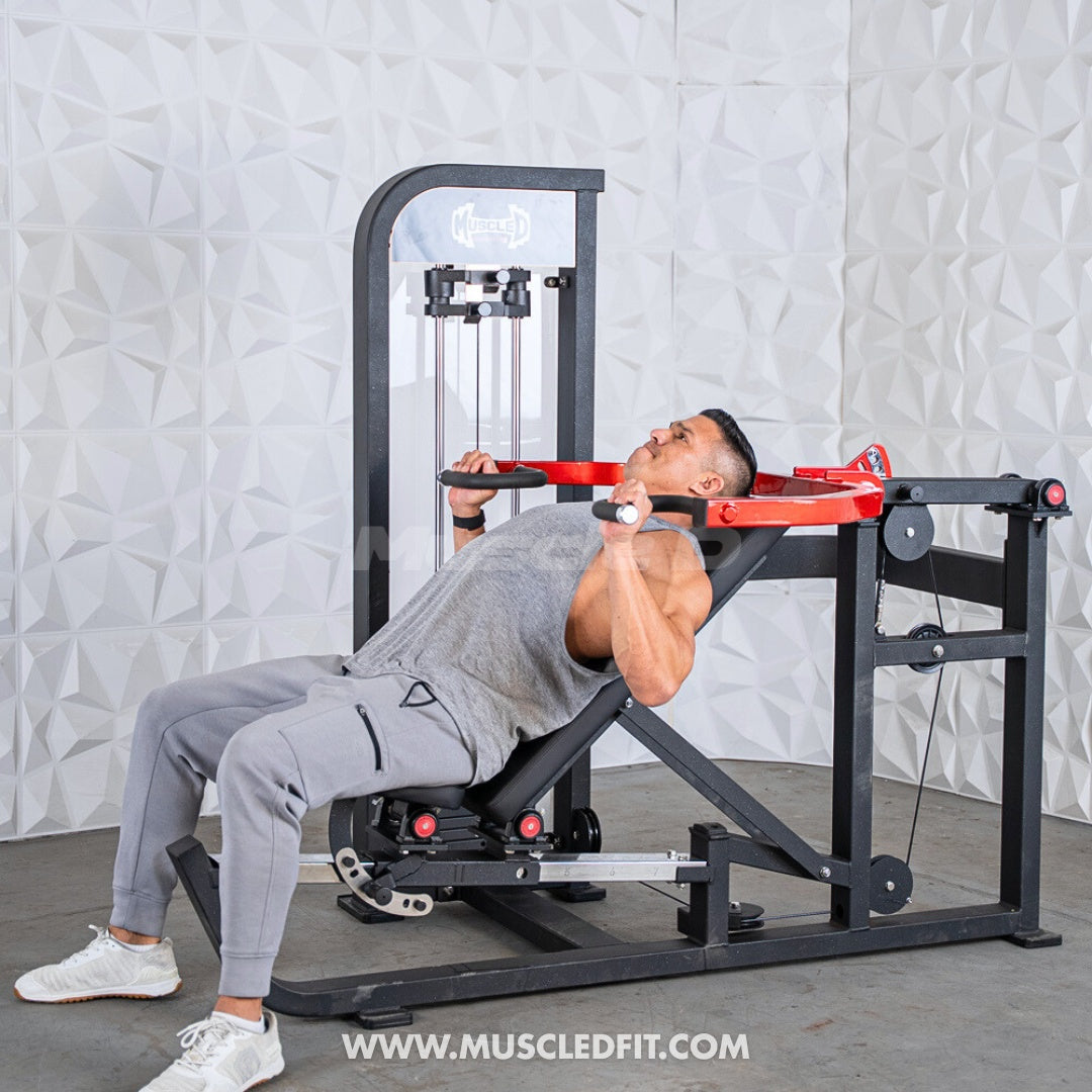 Man using a black and red selectorized multi-press chest and shoulder machine.
