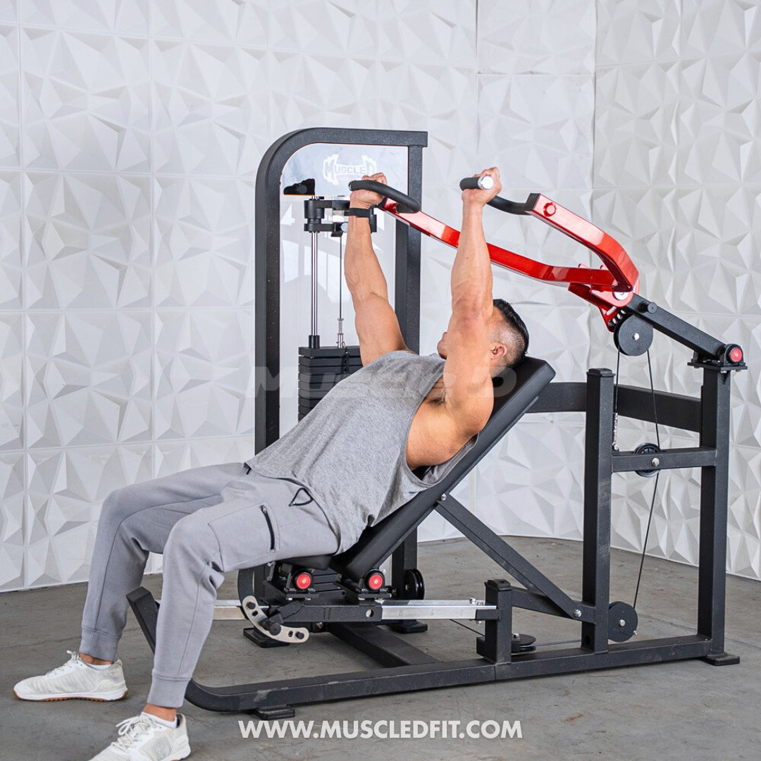 Man using a black and red selectorized multi-press machine for a chest and shoulder workout.
