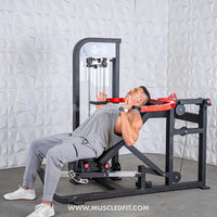 Thumbnail for Man using a black and red multi-press chest and shoulder machine with a white textured wall background.
