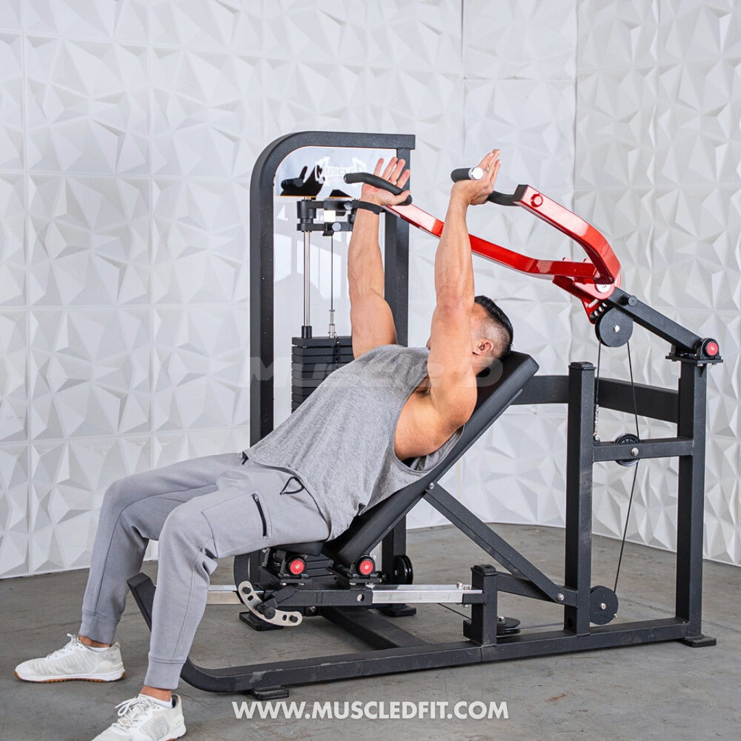 Man using a black and red multi-press machine for chest and shoulder exercises.