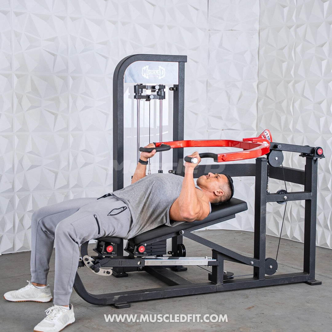 Man using a black and red selectorized multi-press chest and shoulder machine.