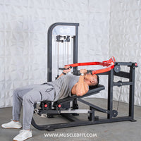 Thumbnail for Man using a black and red selectorized multi-press chest and shoulder machine.