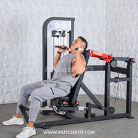 Thumbnail for Man using a black and red selectorized multi-press chest and shoulder press machine.