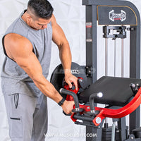 Thumbnail for Man adjusting a black and red biceps/triceps combo gym machine with a 