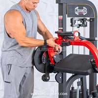 Thumbnail for Man adjusting the red arm of a black selectorized biceps/triceps combo gym machine.