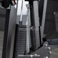 Thumbnail for Close-up of a triceps extension machine showing a spring, weight stack, and part of the seat.