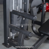 Thumbnail for Close-up of the black handles and weight stack on a selectorized abdominal crunch machine.