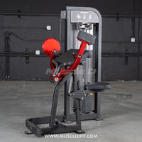 Thumbnail for Black and red biceps curl machine with a weight stack, seat, and arm pads.