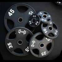 Thumbnail for Black urethane-coated Olympic weight plates in various sizes (2.5, 5, 10, 25, 35, 45 lbs).