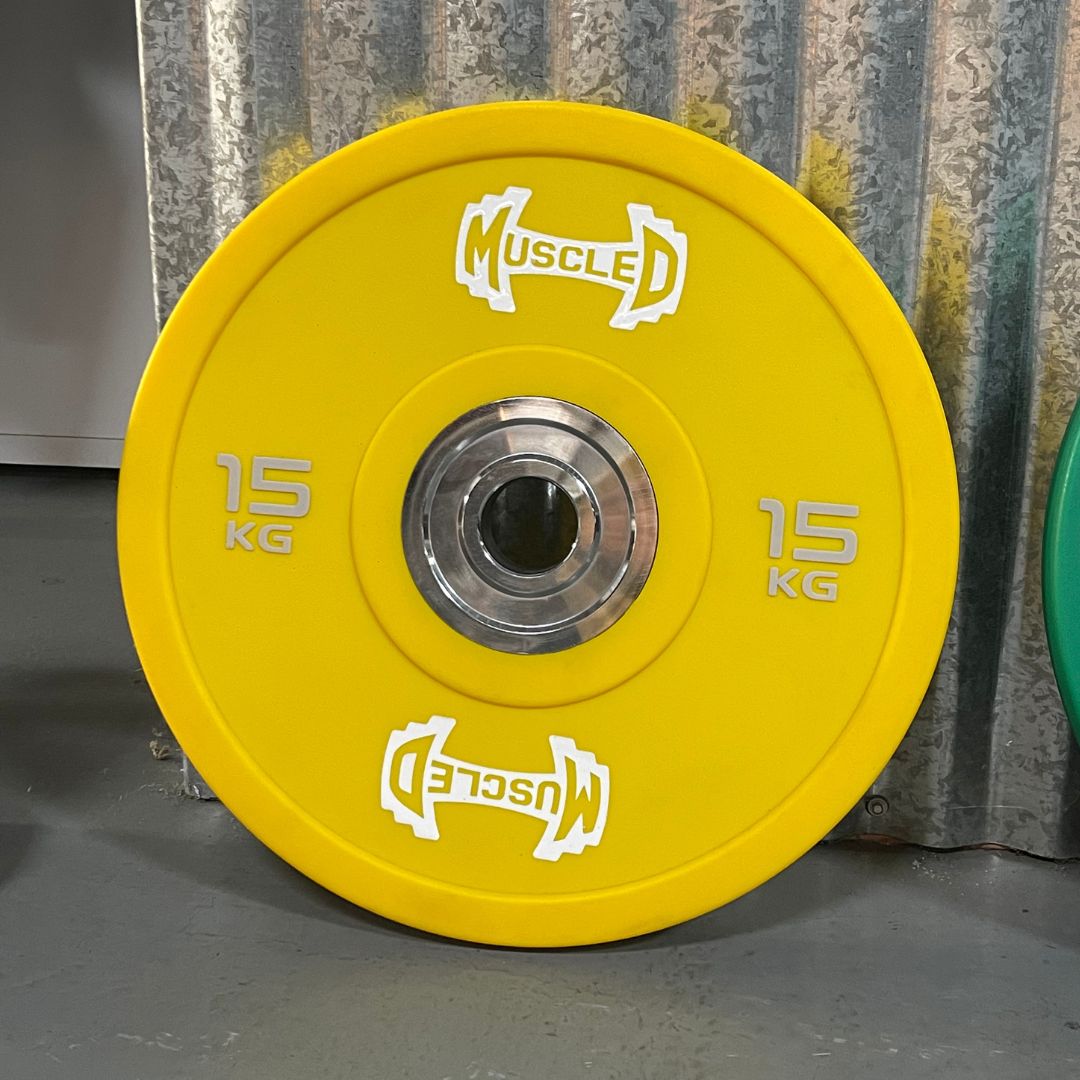 Yellow 15kg urethane bumper plate with "MUSCLED" logo and smooth metal hub.