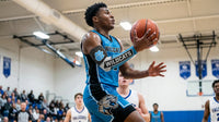 Thumbnail for Basketball player in blue jersey and black arm sleeve with blue paw print and 