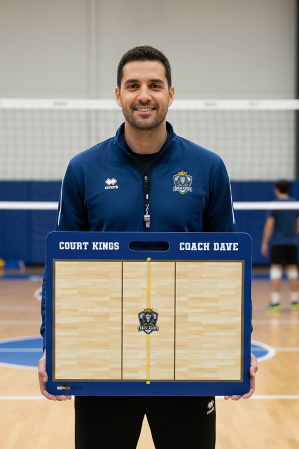 Smiling man in blue jacket holding a custom volleyball coaching board with "Court Kings" and "Coach Dave