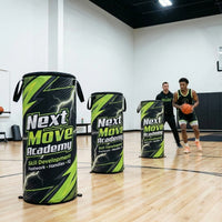 Thumbnail for Three "Next Move Academy" pop-up defenders on a basketball court, with a player and coach in the background.