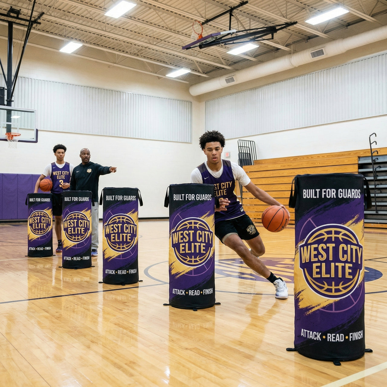 Basketball players training with custom purple and gold pop-up defender cones on a court.