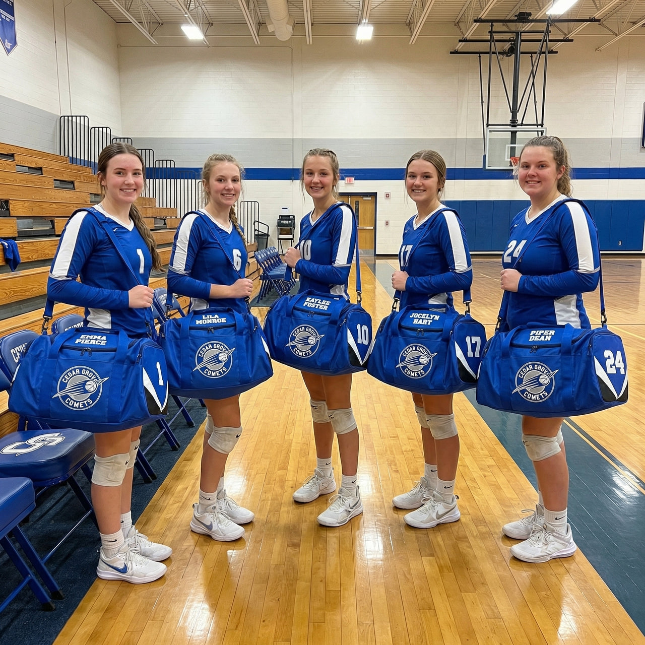 Five volleyball players in blue uniforms holding customized blue duffle bags with names and numbers.