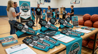 Thumbnail for A table displays custom teal and black arm sleeves with 