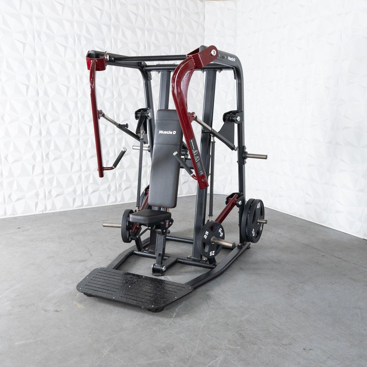 Muscle D Fitness Pro Strength Wide Chest Press machine with black and red frame, bench, and weight plates.