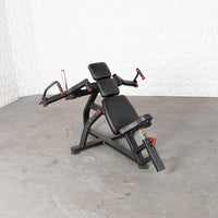 Thumbnail for Black incline pec fly machine with red accents and adjustable seat.