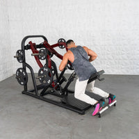 Thumbnail for Man using a red and black chest-supported plate-loaded row machine.