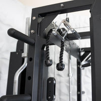Thumbnail for Close-up of black fitness equipment with various attachments, including ropes and handles.