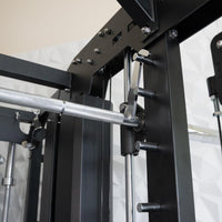Thumbnail for Close-up of a black fitness machine with a silver barbell and various metal components.