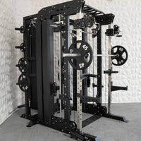 Thumbnail for Black multi-station home gym with barbell, weight plates, and cable attachments.