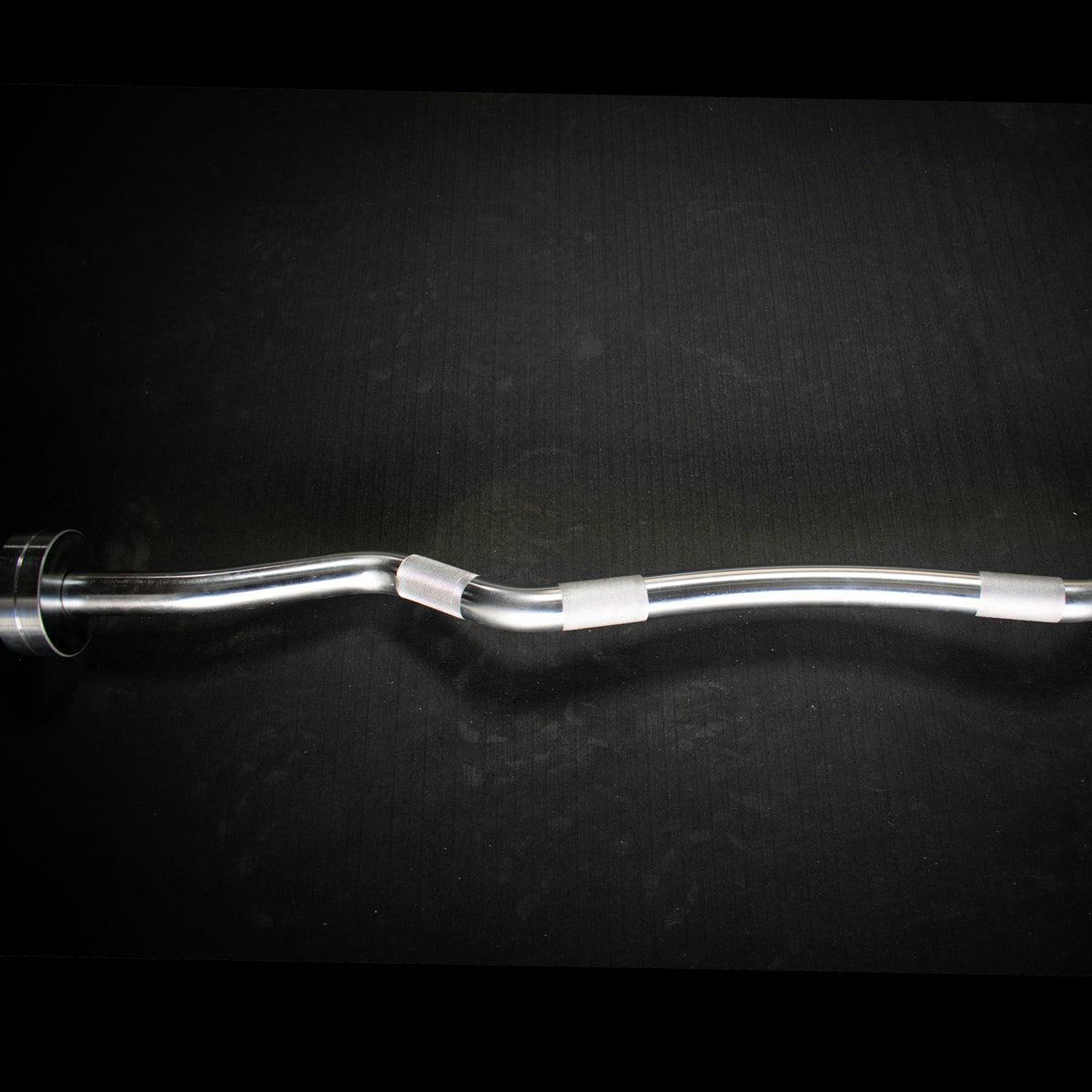 Silver hard chrome curl bar with ergonomic angles and textured grip sections.