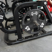 Thumbnail for Close-up of a black plate-loaded fitness machine with a 45lb weight plate attached.