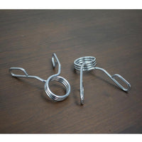 Thumbnail for Pair of silver spring collars for barbells on a dark wood surface.
