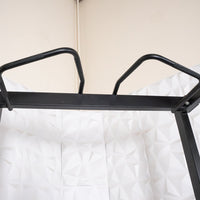 Thumbnail for Close-up of the black pull-up bar with angled grips on the half rack.