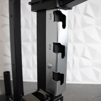Thumbnail for Close-up of a half rack's chrome-plated J-cup with numbered adjustment slots.