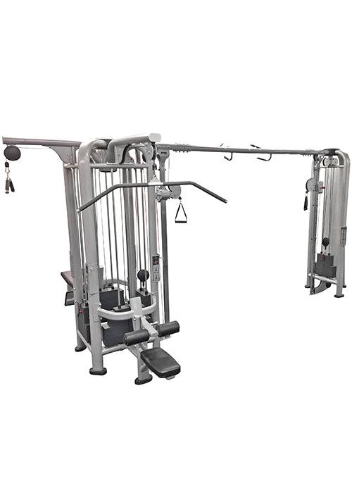 Gray multi-station gym machine with 5 weight stacks, lat pull-down bar, low row, and functional columns.