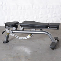 Thumbnail for Gray adjustable weight bench with black padded seats and yellow adjustment knobs.