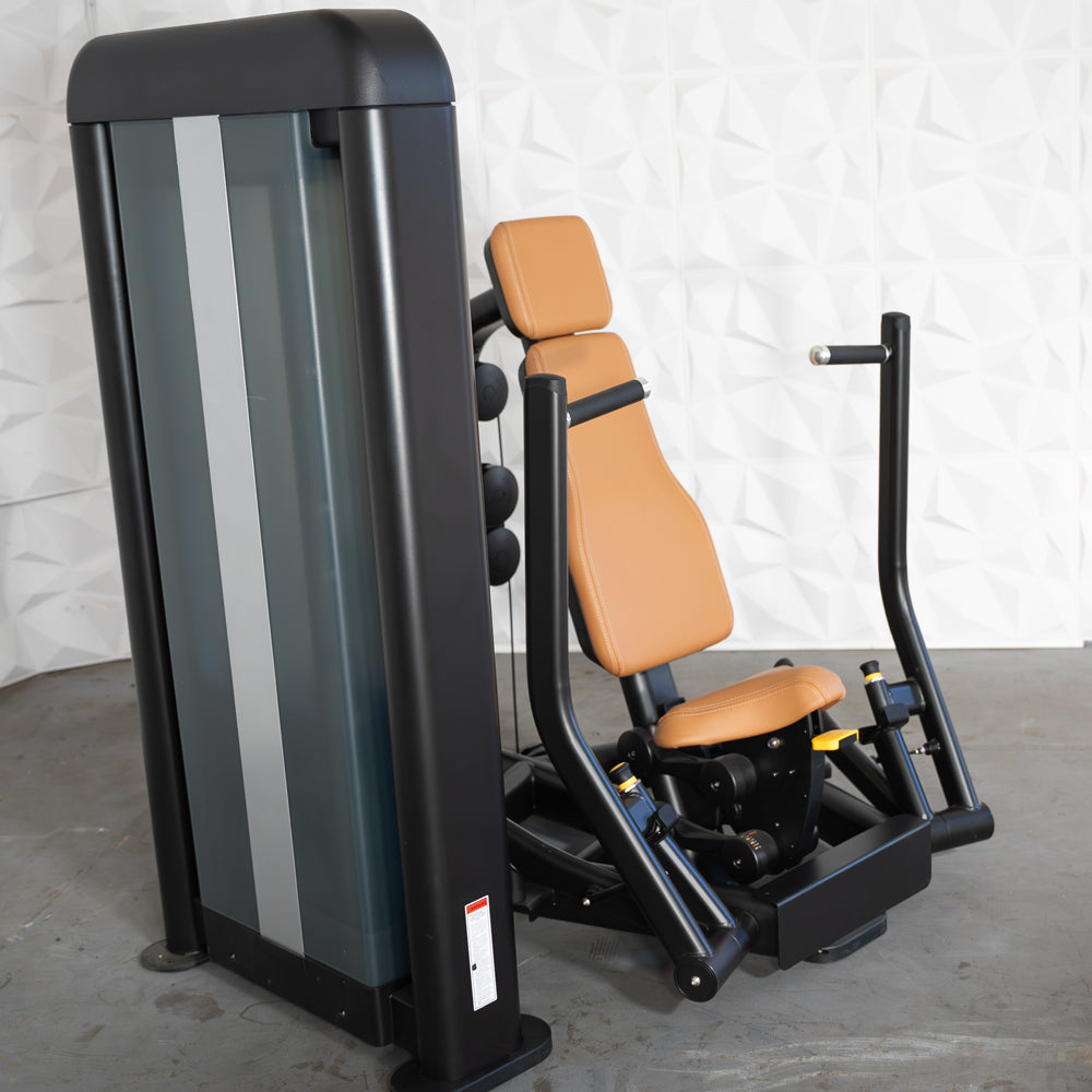 Black and brown commercial chest press machine with weight stack and adjustable seat.