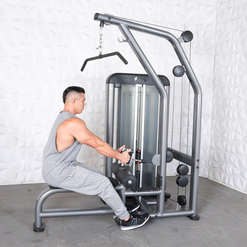 Man performing a low row exercise on a gray and black lat/low row machine with a pin-selectorized weight stack.