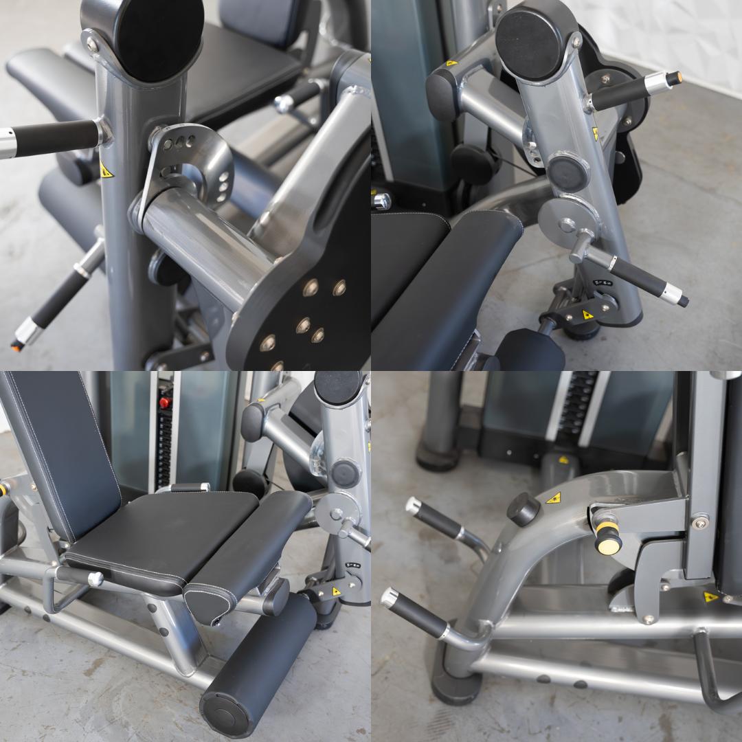 Close-up views of a grey and black leg extension and curl combo machine.