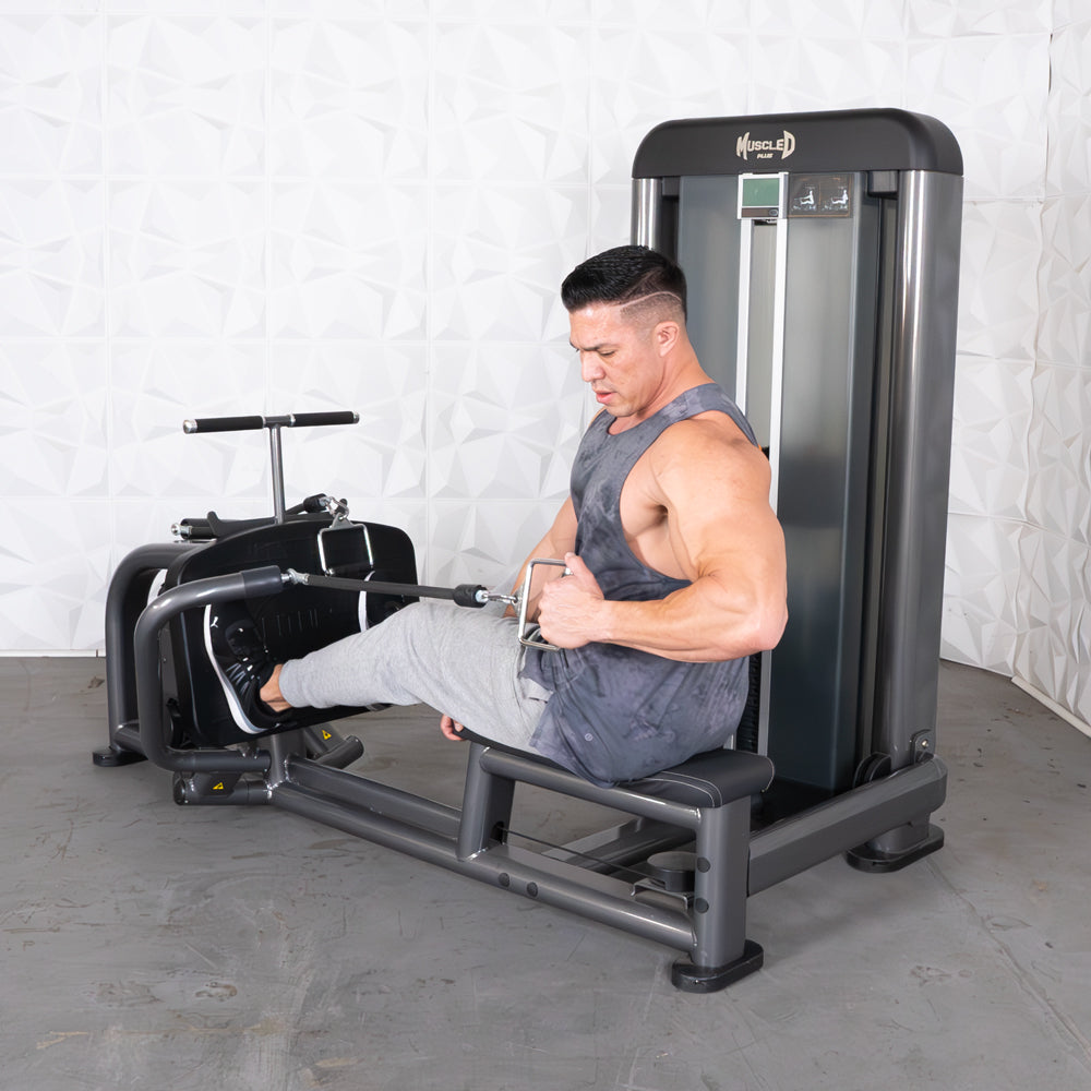 Man using a Muscle D Fitness Elite Plus Long Pull Row machine.