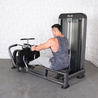 Thumbnail for Man in gray tank top using a Muscle D Fitness long pull row machine.