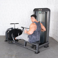 Thumbnail for Man using a gray iso-lateral long pull row machine with black accents.