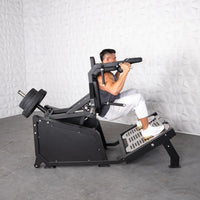 Thumbnail for Man performing a squat on a black plate-loaded squat machine with weights.
