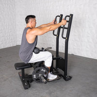 Thumbnail for Man using a black plate-loaded hip thrust machine with a 25lb weight plate.
