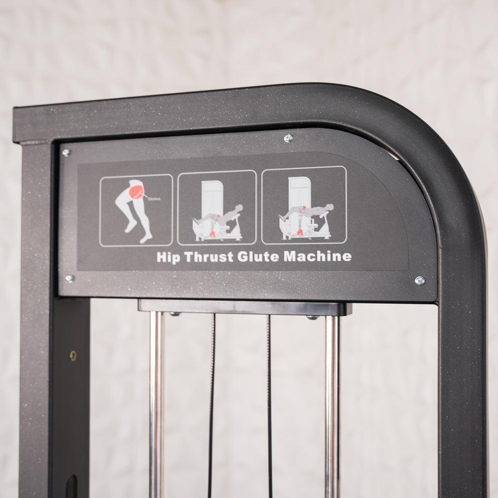 Close-up of a Hip Thrust Glute Machine with instructional diagrams on the side.