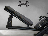 Thumbnail for Black leg press machine with an adjustable back pad and handles.