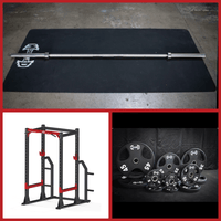 Thumbnail for Barbell on mat, power cage, and various weight plates.