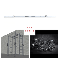 Thumbnail for Barbell, wall-mounted rack, and various weight plates.