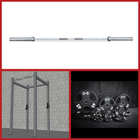 Thumbnail for Barbell, 4-post power rack, and a stack of black weight plates with white numbers.